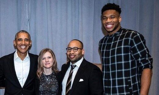 Ron Shade, seen in the photo next to NBA champion Giannis Antetokounmpo and former President Barack Obama, said that he is giving his clients the best information possible and leaving it up to them to take the vaccine.