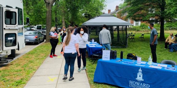 Vaccine outreach teams from the College of Medicine at Howard University and Rodham Institute at George Washington University educate residents about the vaccine and offer vaccinations.