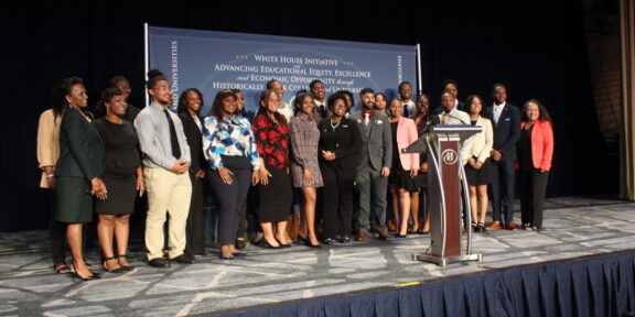 White House HBCU Scholars and White House HBCU Initiative staff pose for a photo at the 2022 White House National HBCU Conference.