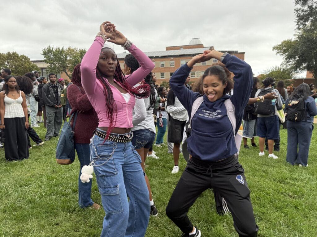 Students (Left to right) Journey Bradberry and Delilah O'Neal doing Adamn Killa's waiting for him on the Yard doing his signature dance move.