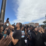 Adamn Killa surrounded by crowd of students at the Flagpole on the Yard. (Photo: Bamidele Aina/HUNewsService.com)