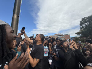 Adamn Killa surrounded by crowd of students at the Flagpole on the Yard. (Photo: Bamidele Aina/HUNewsService.com)