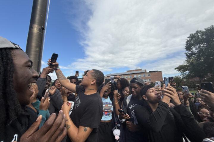 Adamn Killa surrounded by crowd of students at the Flagpole on the Yard. (Photo: Bamidele Aina/HUNewsService.com)