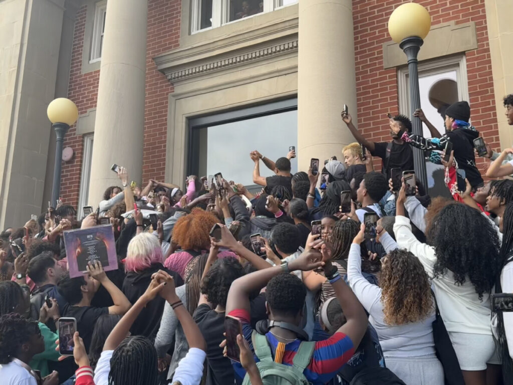 Crowd and Adamn Killa doing his dance move on Carnegie stairs (Photo: Bamidele Aina/HUNewsService.com)