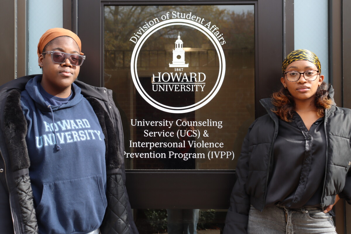 Diandra Blake (left) and Monica Maya (right) stand in front of the door of University Counseling Services. (Tatiana Allen/HUNewsService.com)