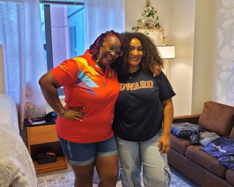 The founder of Move-In Day Mafia, Teej Mercer (L), and a scholar of the organization, Alexis Rodriguez (R), pose for a picture in Rodriguez’s newly decorated dorm room at Howard University. (Photo courtesy of LaTerra Wise)