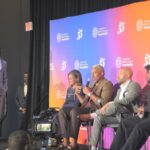 U.S. Senator Rev. Raphael Warnock moderates a panel on the importance of Black fatherhood in the context of maternal mortality at the 55th Congressional Black Caucus Foundation’s Annual Legislative Conference. (Photo: Myla S. Roundy/HU News Service)