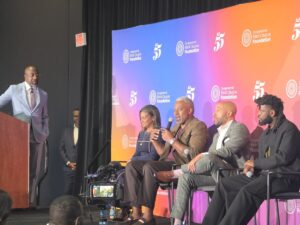 U.S. Senator Rev. Raphael Warnock moderates a panel on the importance of Black fatherhood in the context of maternal mortality at the 55th Congressional Black Caucus Foundation’s Annual Legislative Conference. (Photo: Myla S. Roundy/HU News Service)