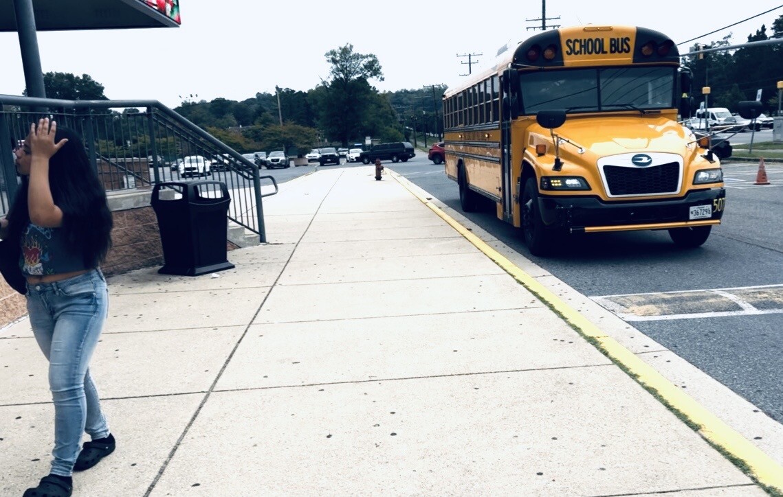Photo of PGCS school bus outside of Bowie high school.