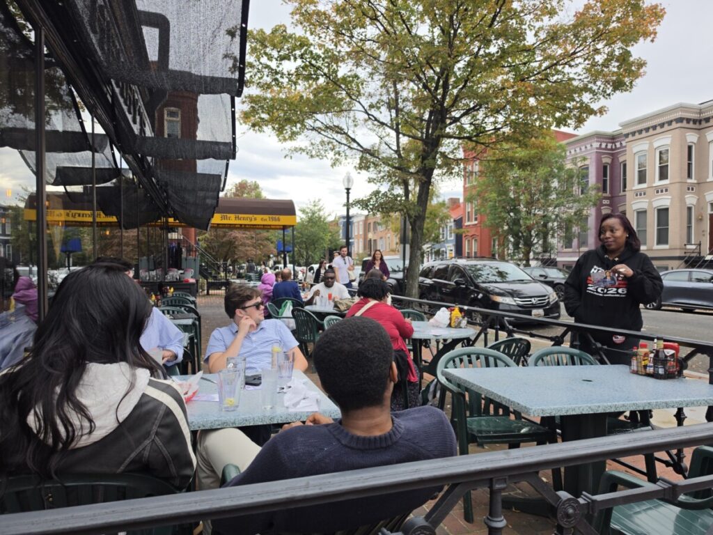 Independent candidate for D.C. Mayor, Rhonda Hamilton, speaks to voters at the restaurant Mr. Henry’s DC on Pennsylvania Avenue Southeast on Oct. 10. (Photo: Myla S. Roundy/HU News Service)