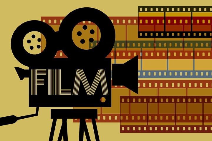 Graphic of film camera with film strips. (Graphic courtesy of Geralt via Pixabay)