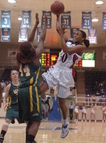 Sequoya Howard shoots a layup against George Mason University during the 2006 season. (Photo courtesy of Sequoya Howard)