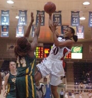 Sequoya Howard shoots a layup against George Mason University during the 2006 season. (Photo courtesy of Sequoya Howard)