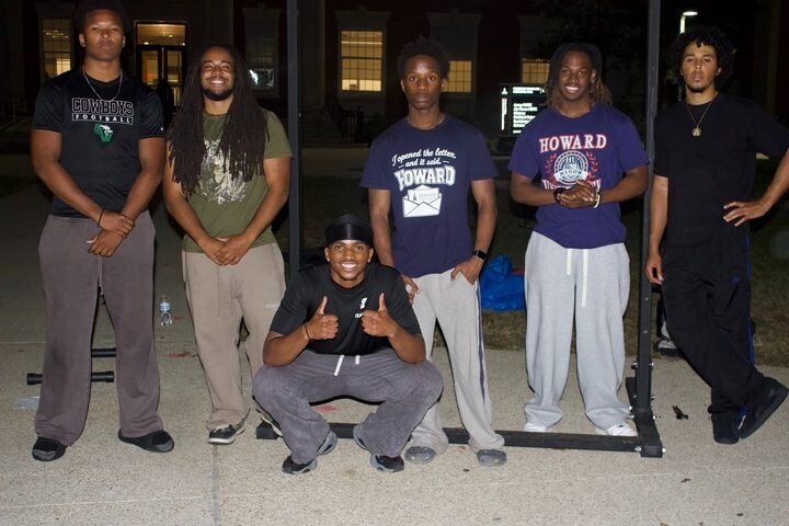 Members of the Howard University Calisthenics Club pose for a picture on Oct. 21 outside of Frederick Douglass Memorial Hall. (Brycen Bracy/The Hilltop)